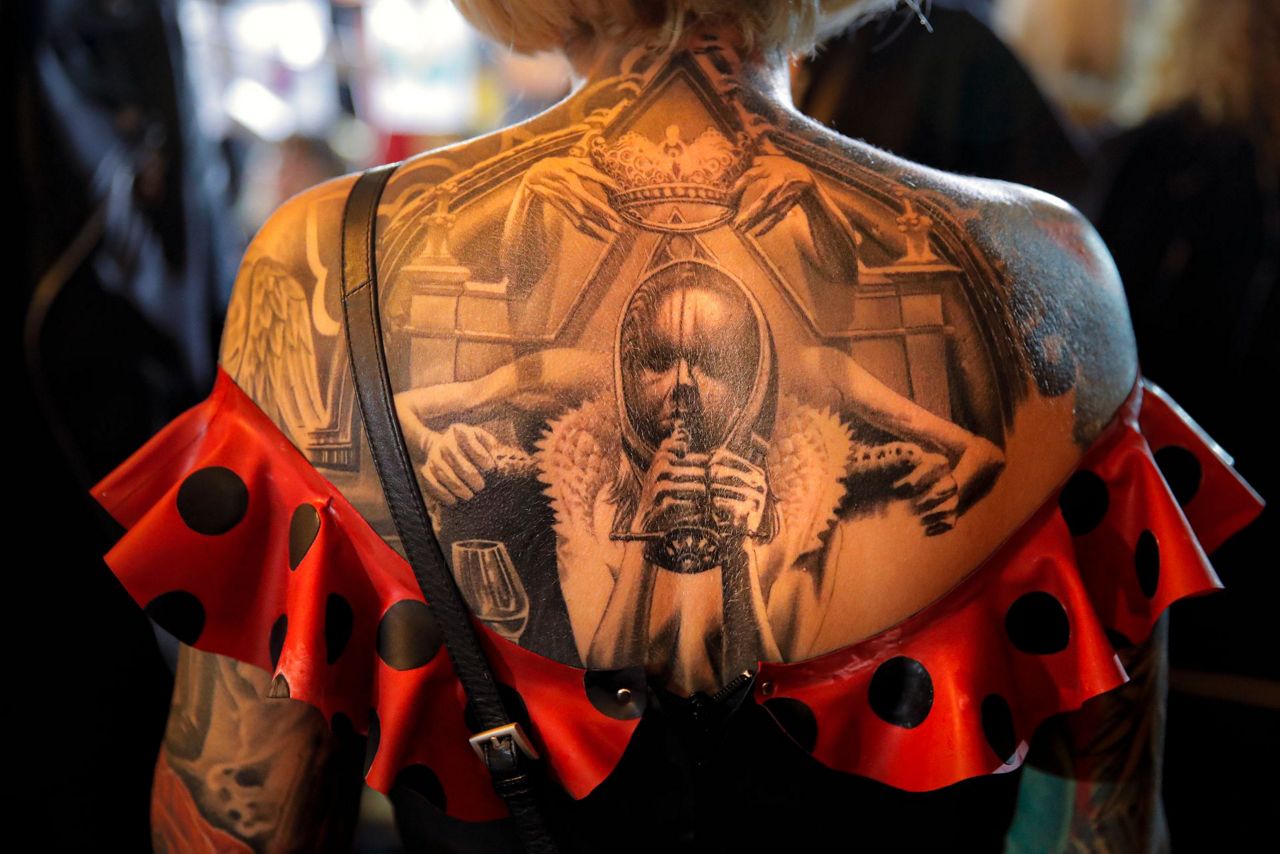 AP PHOTOS Cream of tattoos on show at Romanian palace
