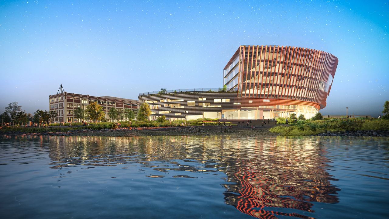 A rendering of the new campus Northeastern University plans for its Roux Institute, on Beanpot Circle in Portland. The renovated B&M Baked Beans factory is at left. (Northeastern University)