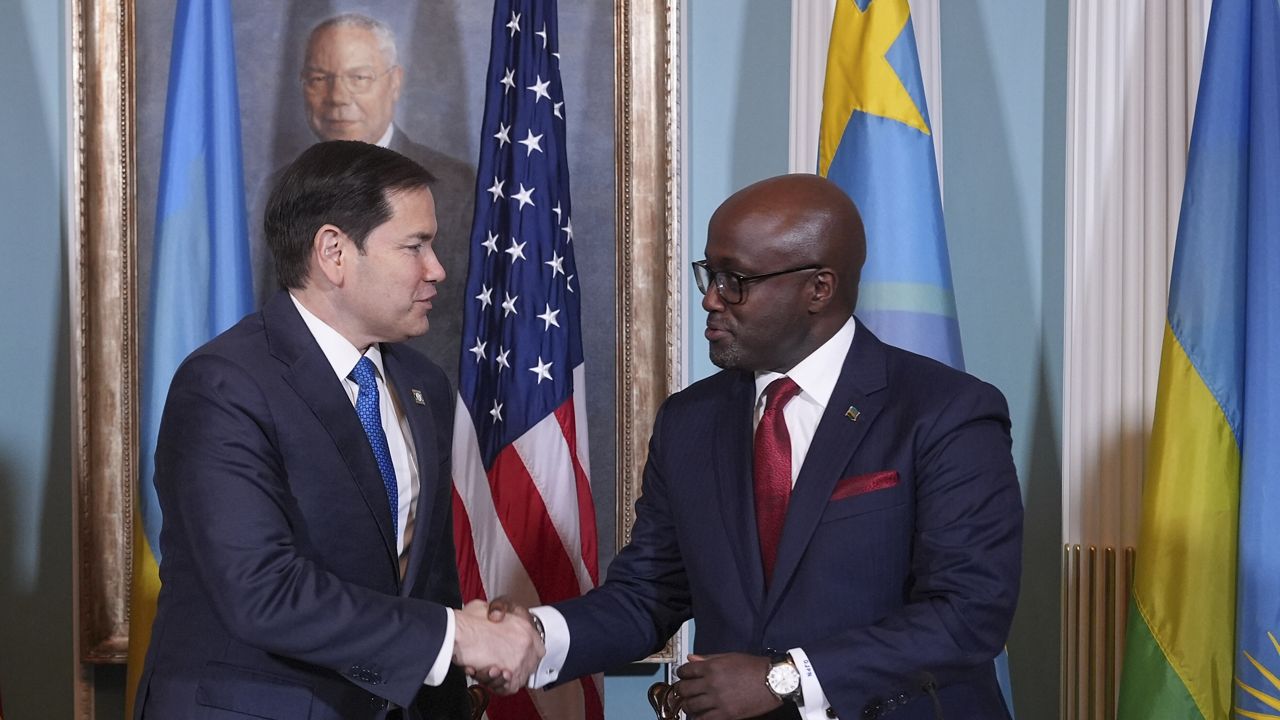 Secretary of State Marco Rubio hosts a Declaration of Principles signing ceremony with Congo's Foreign Minister Therese Kayikwamba Wagner, not pictured, and Rwanda's Foreign Minister Olivier Nduhungirehe, right, Friday, April 25, 2025, at the State Department in Washington. (AP Photo/Jacquelyn Martin)