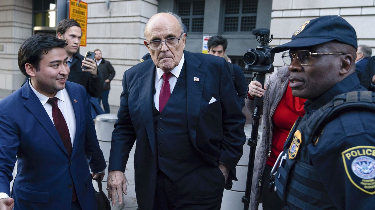 FILE - Former Mayor of New York Rudy Giuliani leaves the federal courthouse in Washington, Dec. 15, 2023. (AP Photo/Jose Luis Magana, File)