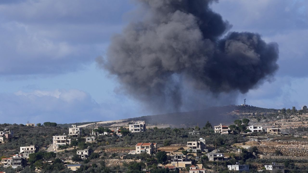 Black smoke rises from an Israeli airstrike on the outskirts of Aita al-Shaab, a Lebanese border village with Israel, as it is seen from Rmeish village in south Lebanon, Tuesday, Nov. 21, 2023. Tension has been rising along the Lebanon-Israel border since the Oct. 7 attack by the Palestinian militant group Hamas on southern Israel. (AP Photo/Hussein Malla)