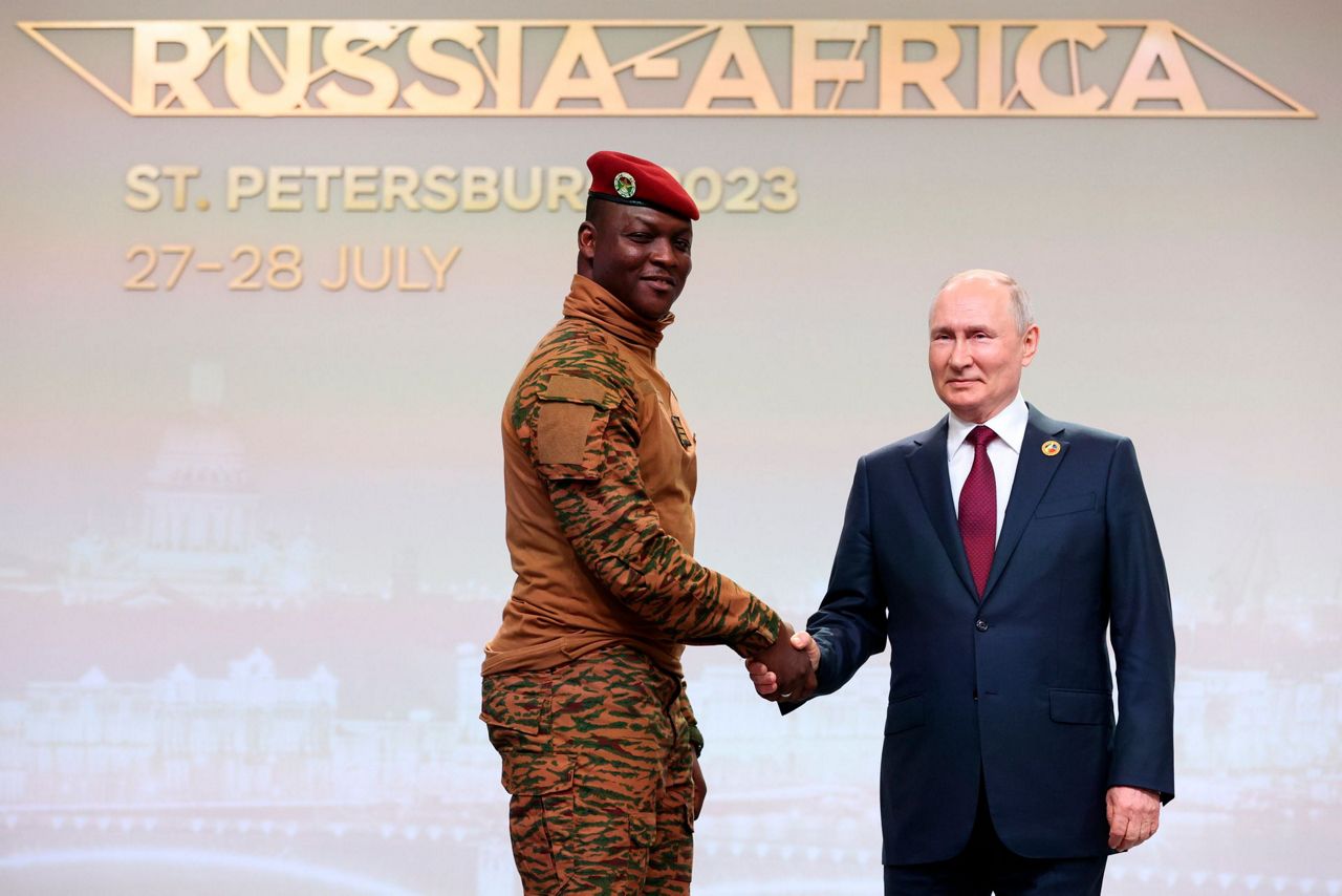 Putin woos African leaders at a summit in Russia with promises of ...