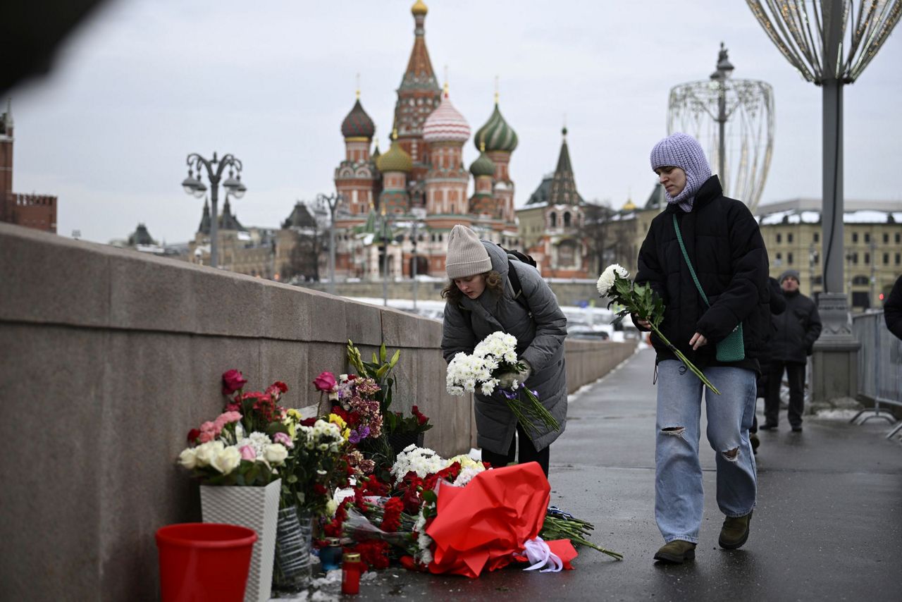 A Russian court sentences the co-chair of a Nobel-winning rights group ...