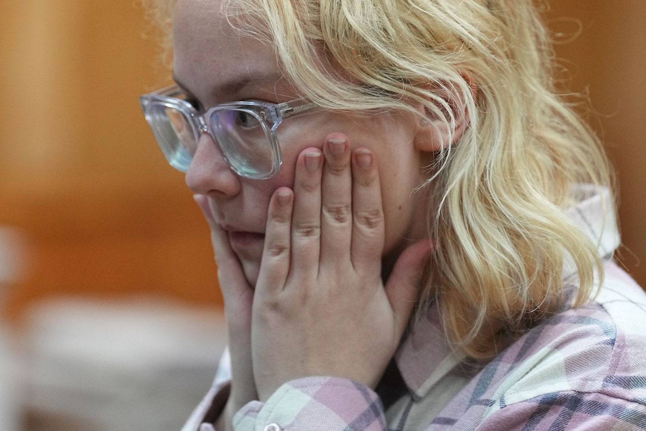 Russian court extends jailing of teenage singer over street