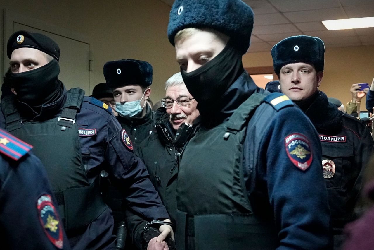 A Russian court sentences the co-chair of a Nobel-winning rights group ...