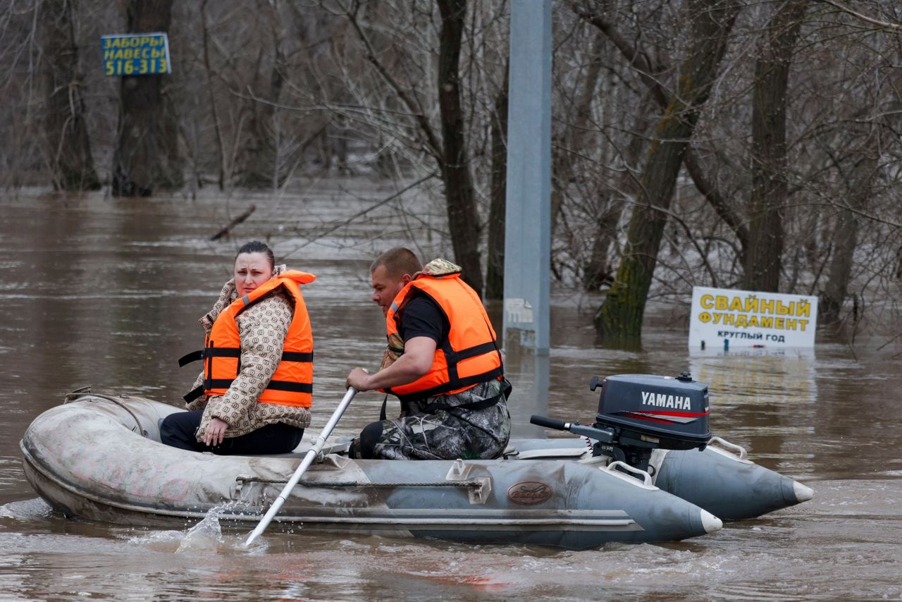 Water levels rise and homes flood in Russia after a dam bursts near the ...