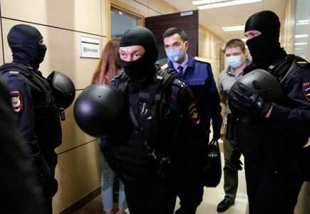 Russian police raid Navalny's home, offices 