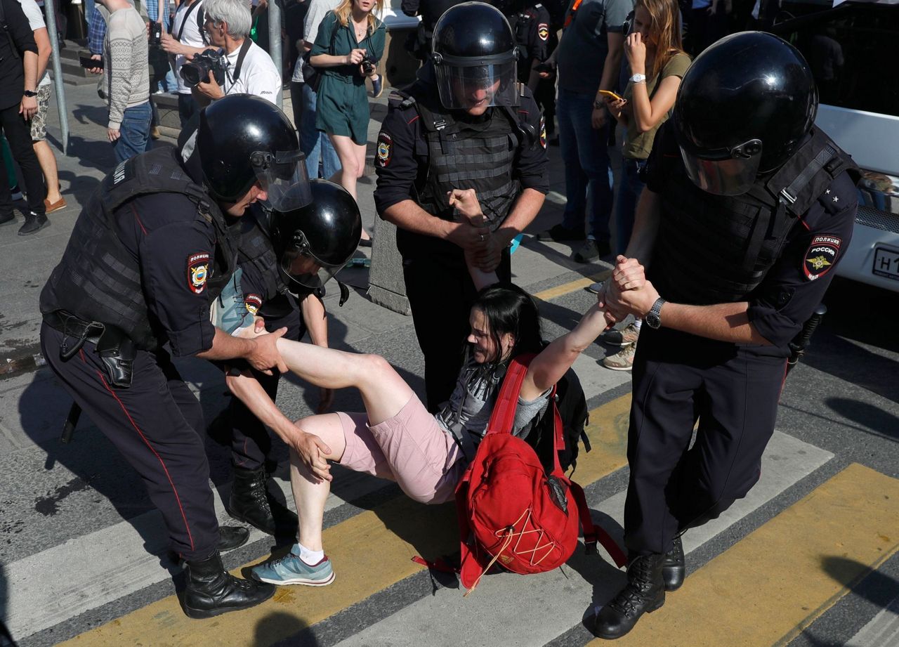 Russian police have cracked down fiercely on demonstrators in central Mosco...