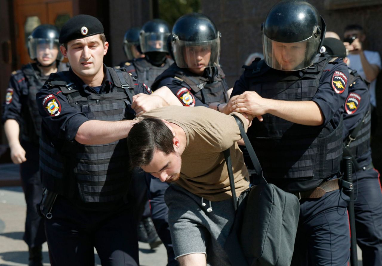 Russian police on Saturday began arresting... 