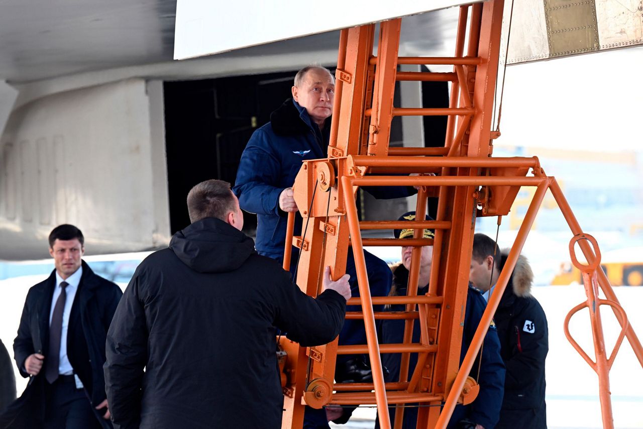 Putin takes a flight in nuclear-capable bomber in a tough message to ...