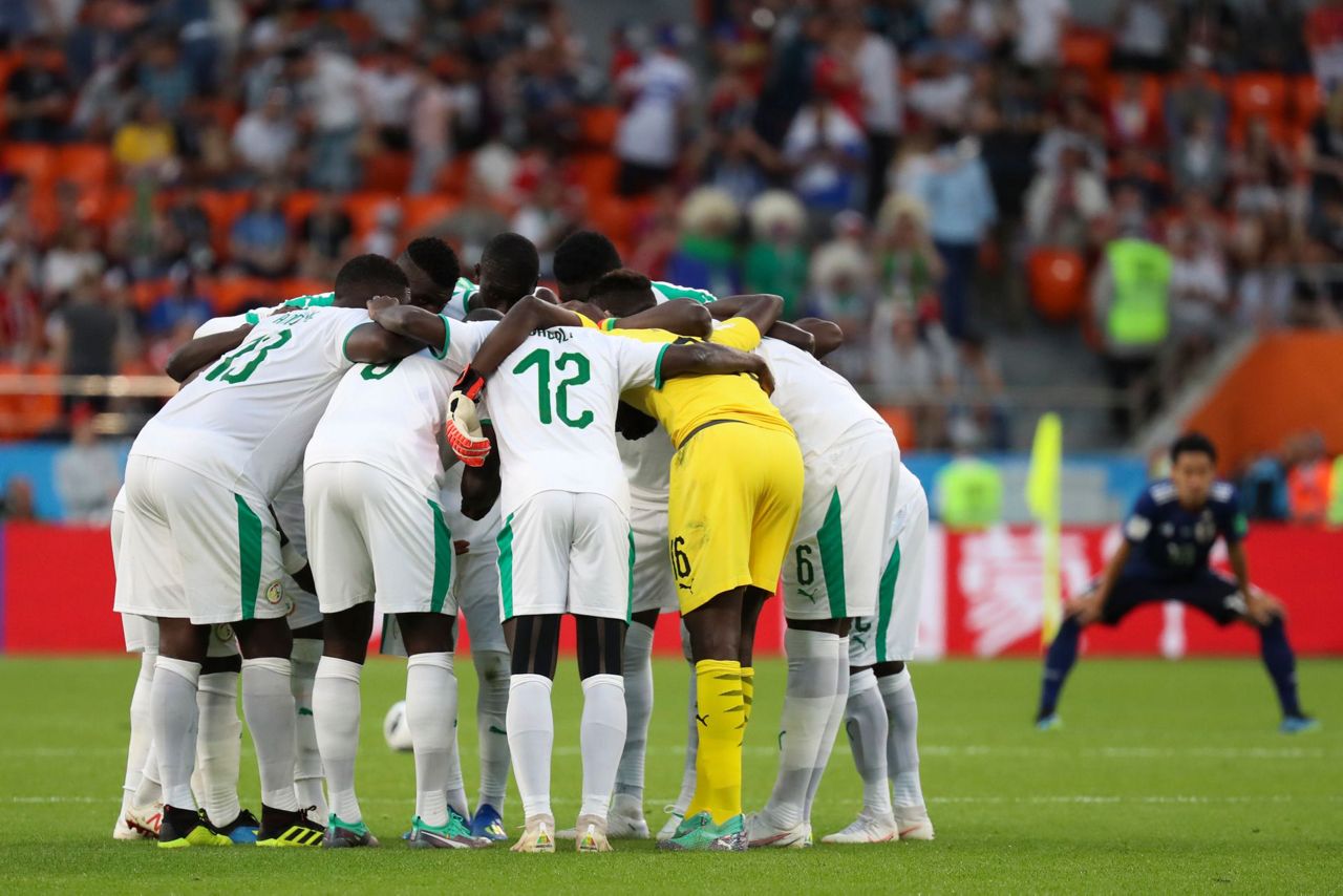 Honda goal gives Japan a 2-2 draw with Senegal at World Cup