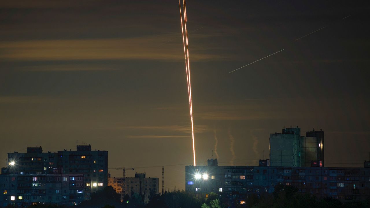Russian rockets are launched against Ukraine from Russia's Belgorod region, seen from Kharkiv, Ukraine, Sunday, July 16, 2023. (AP Photo/Vadim Belikov)