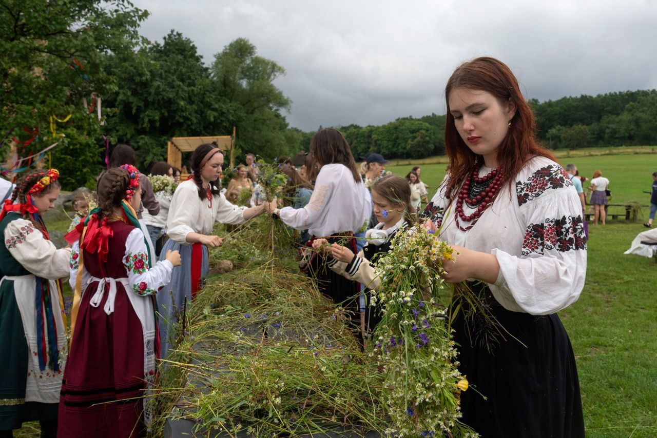 Under curfew, Ukrainians mark midsummer with bonfire jumping at a ...