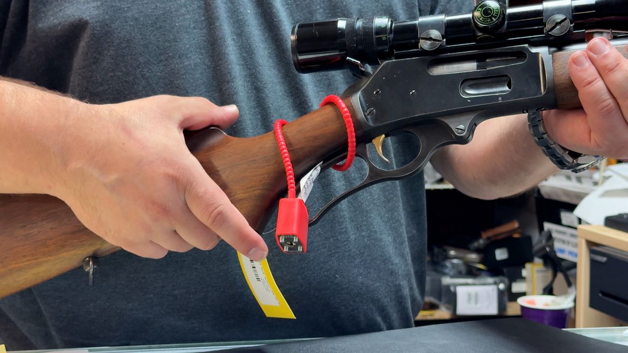 Gun store owners urge the safety and use of gun locks and safes.