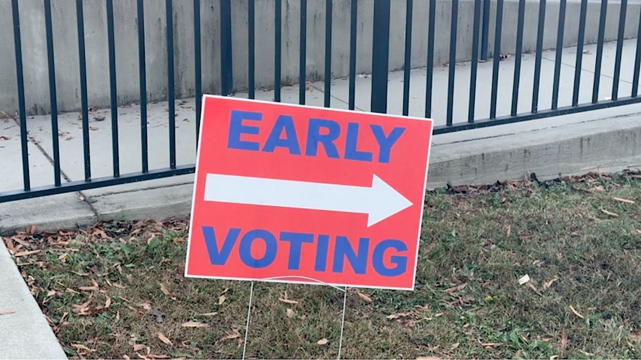 A sign points voters to an early polling center in Greenville, South Carolina, ahead of the 2024 Presidential Election. 