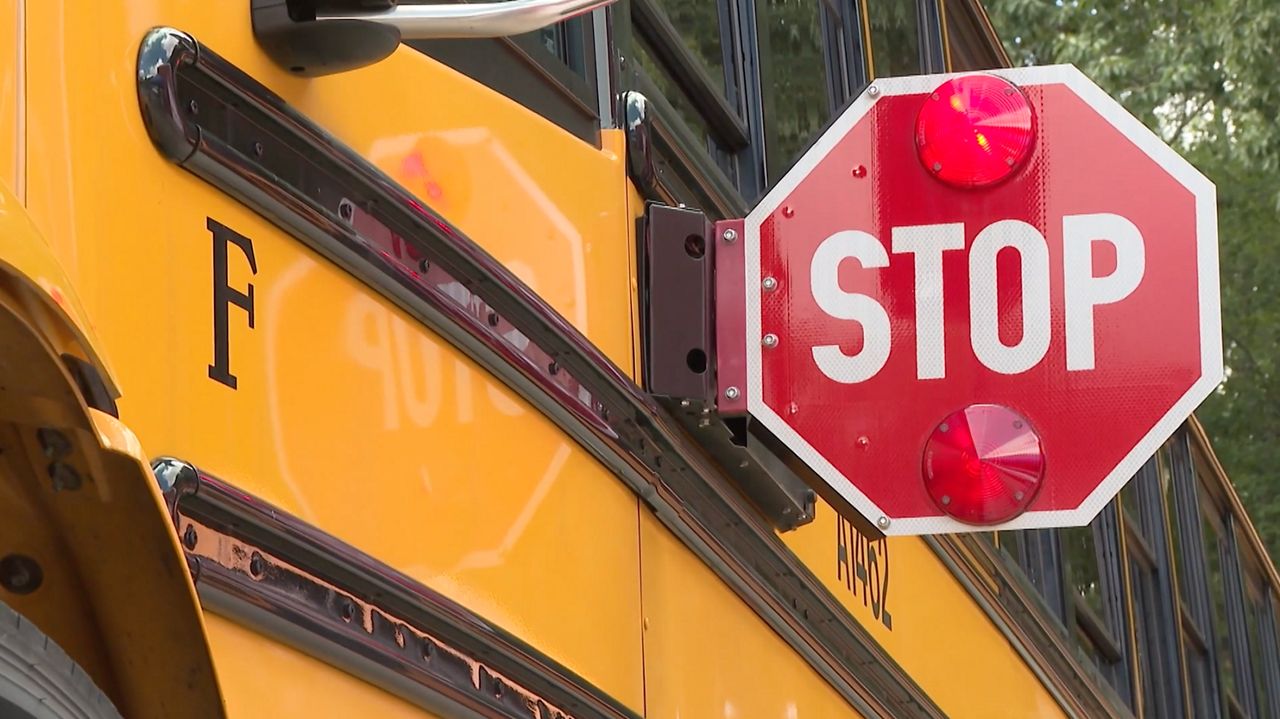 South Carolina school bus extends its stop sign. 