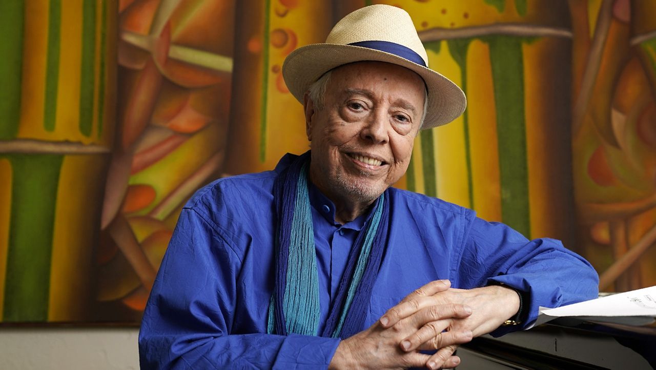 Brazilian musician Sergio Mendes sits for a portrait at home in Los Angeles, May 18, 2021. (AP Photo/Chris Pizzello, File)