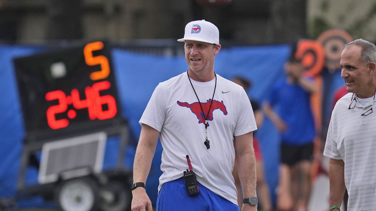 SMU head football coach Rhett Lashlee watches an NCAA college football practice in Dallas, Friday, Aug. 9, 2024. (AP Photo/LM Otero)