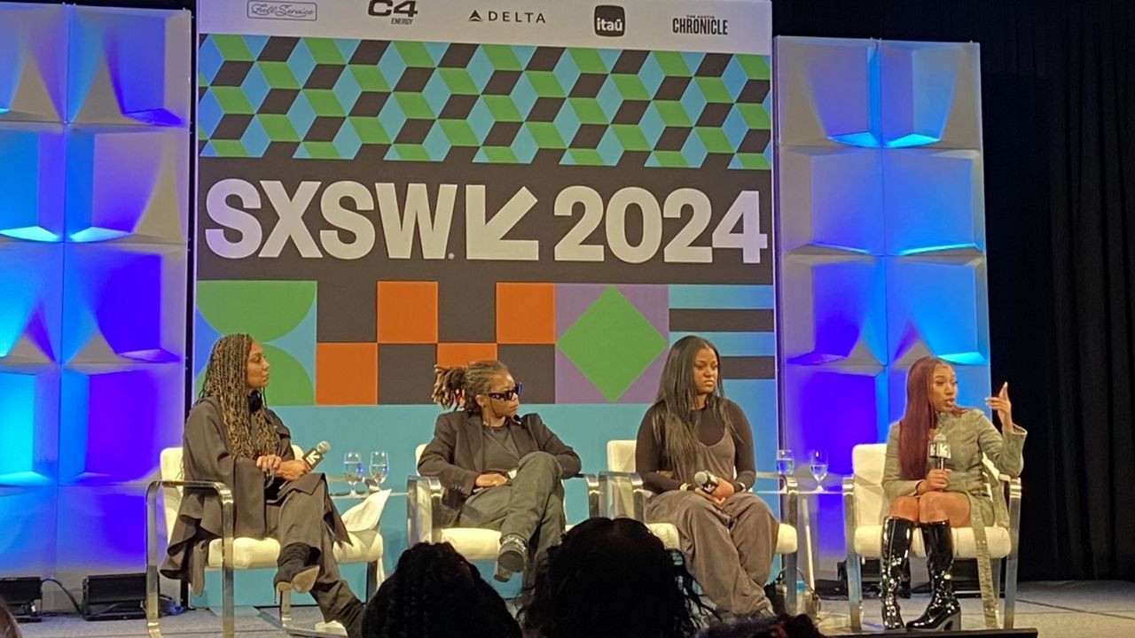 DJ Rosegold (far right) answers a question from an audience member at a panel titled “Women at the Crossroads of Independent Music, Culture, and Entrepreneurship.” Left to right: Joi Brown, Kodie Shane, Eboni Gentry, DJ Rosegold. (Spectrum News 1/Christine Sanchez)