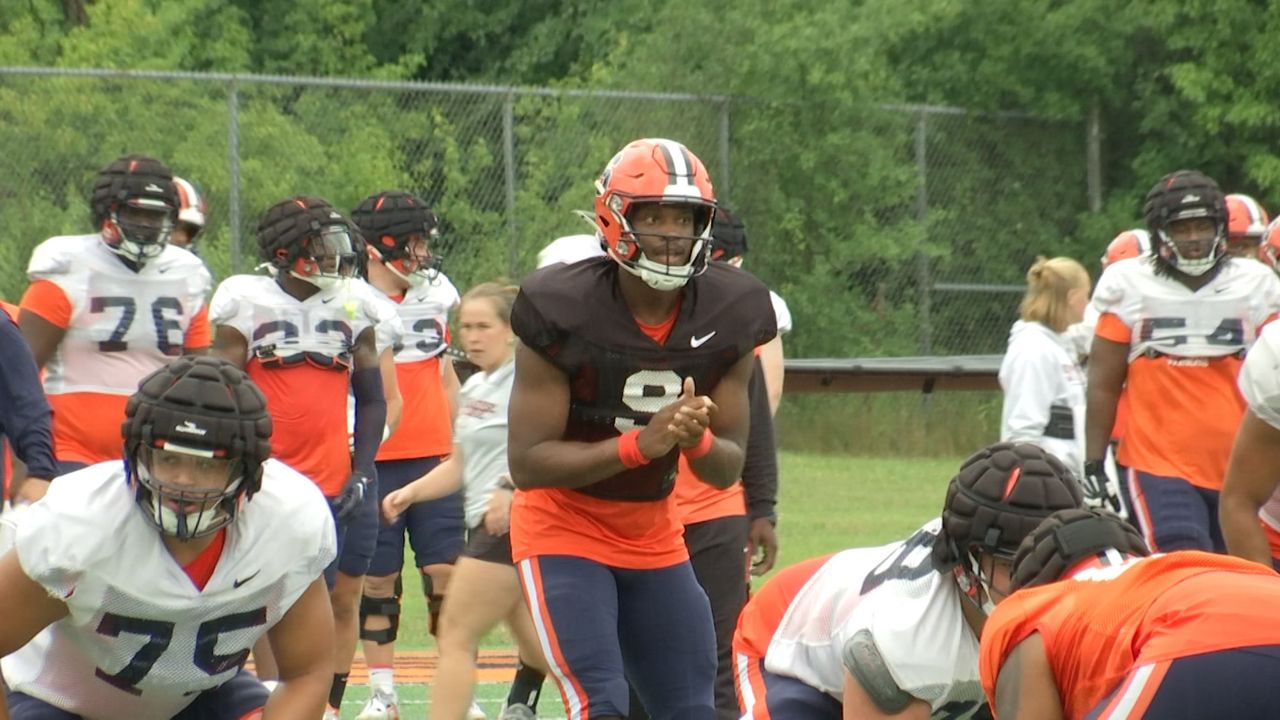 Michael Johnson Jr. leads the offense at practice on Tuesday (Jesse MacWilliam - Spectrum News 1)