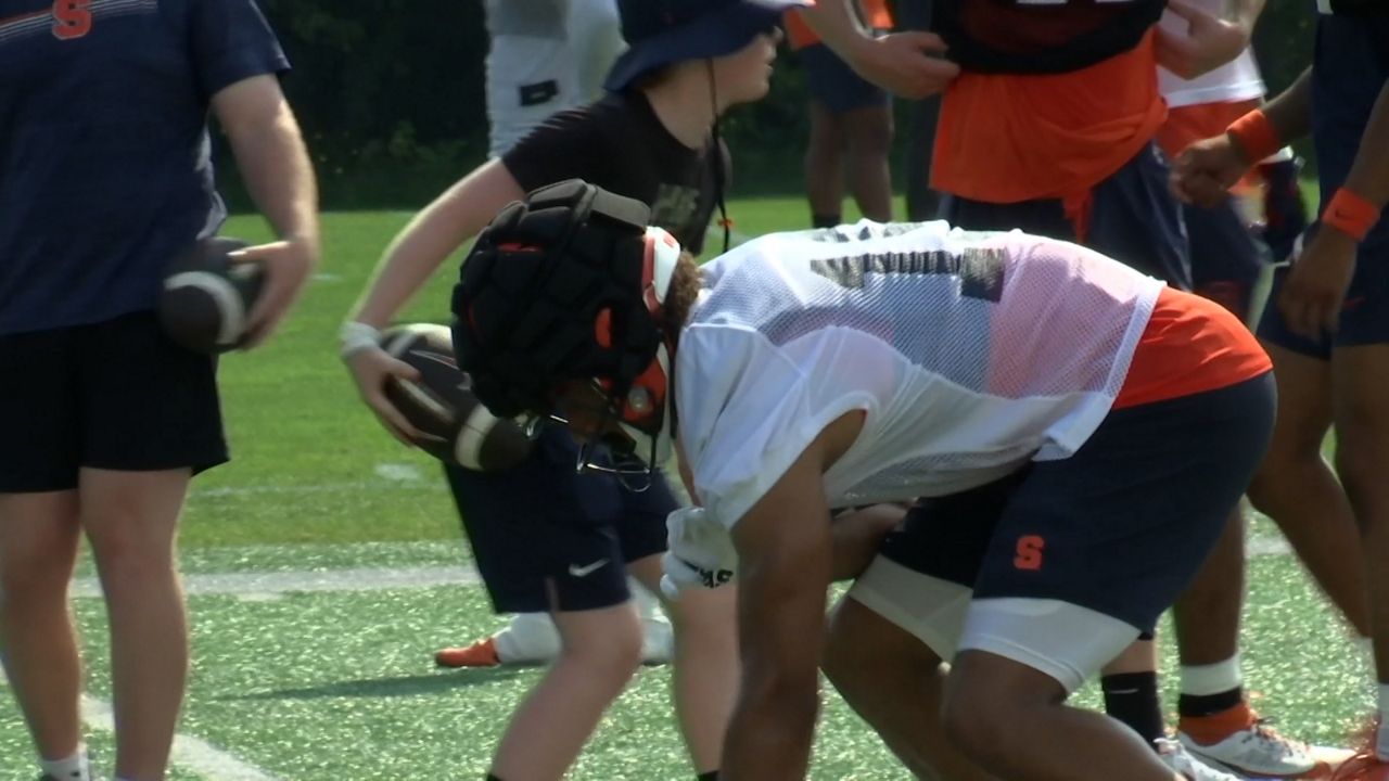 Oronde Gadsden lines up during a drill in practice (Jesse MacWilliam - Spectrum News 1)