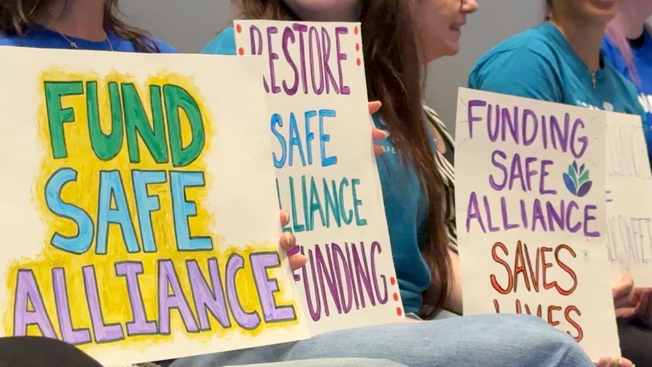 Community calls on Charlotte to restore funding to domestic violence nonprofit