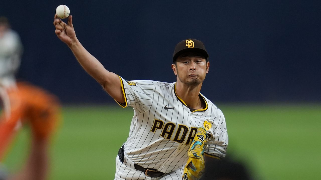 San Diego Padres starting pitcher Yu Darvish works against a Houston Astros batter during the first inning of a baseball game Monday, Sept. 16, 2024, in San Diego. (AP Photo/Gregory Bull)