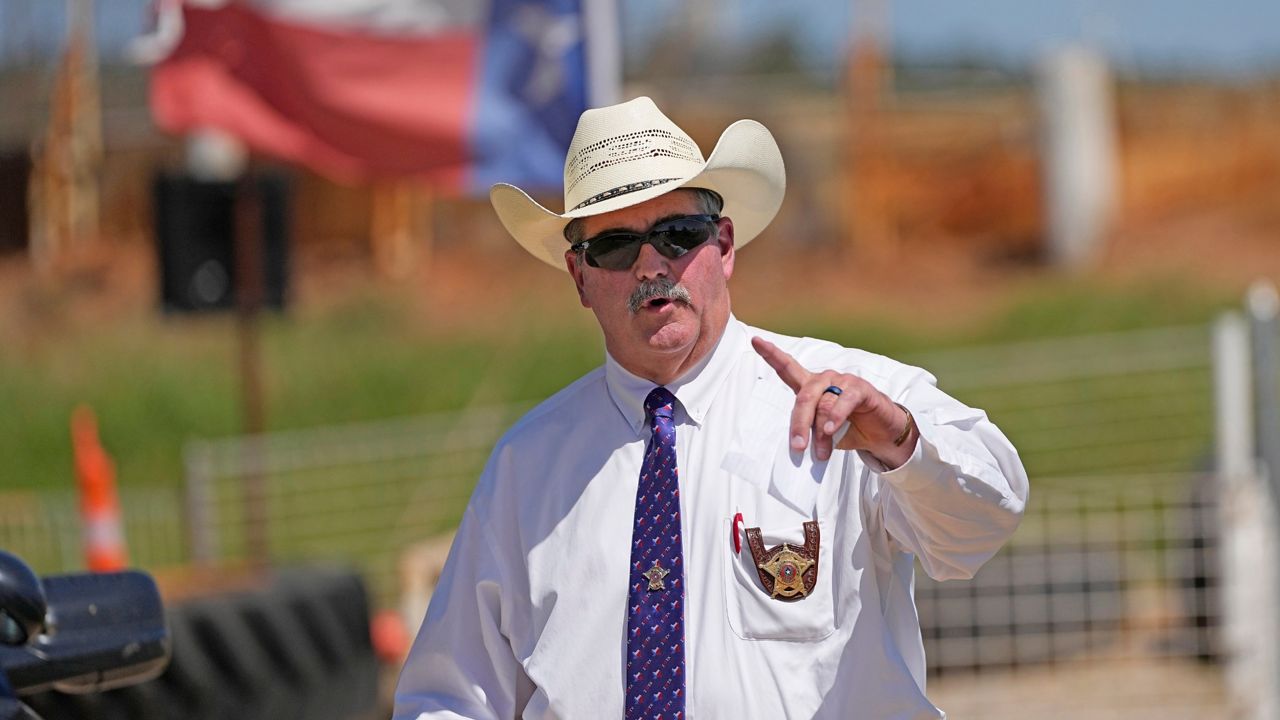 San Jacinto County Sheriff Greg Capers answers a question after a news conference, Sunday, April 30, 2023, in Cleveland, Texas. Capers, who has faced years of complaints about dysfunction and corruption, was repeatedly reported to state and federal law enforcement by his own deputies, but an outside investigation never gained momentum, according to interviews and records reviewed by The Associated Press. (AP Photo/David J. Phillip)