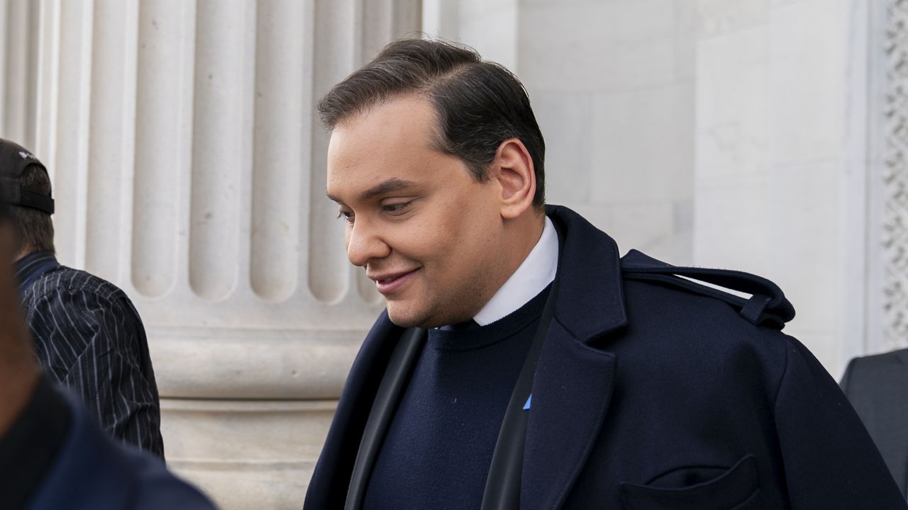 FILE - Rep. George Santos, R-N.Y., leaves the Capitol after being expelled from the House of Representatives, Friday, Dec. 1, 2023, in Washington. (AP Photo/Stephanie Scarbrough, File)