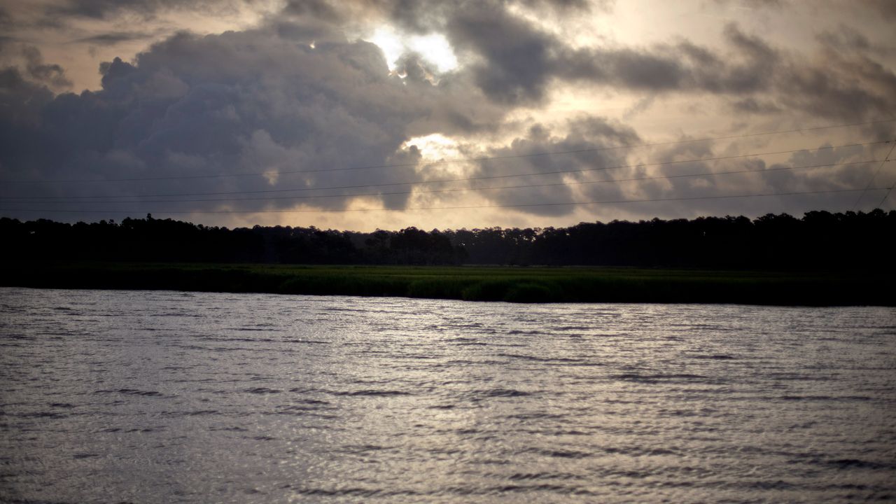 The sun rises over Sapelo Island, Ga., a Gullah-Geechee community, on June 10, 2013. (AP Photo/David Goldman, File)