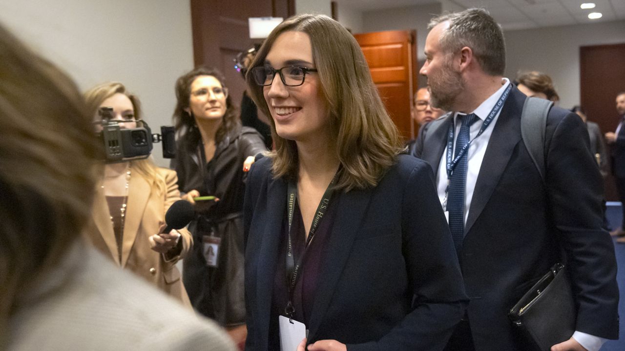 Rep.-elect Sarah McBride, D-Del., center, leaves a meeting of House Democrats on Capitol Hill, Tuesday, Nov. 19, 2024, in Washington. (AP Photo/Mark Schiefelbein)