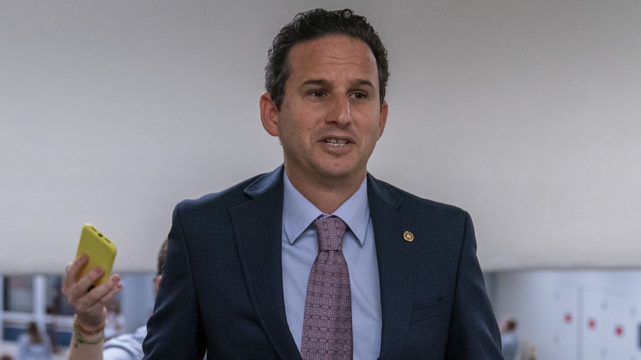 Sen. Brian Schatz, D-Hawaii, speaks with reporters in Washington. (AP Photo/Alex Brandon)