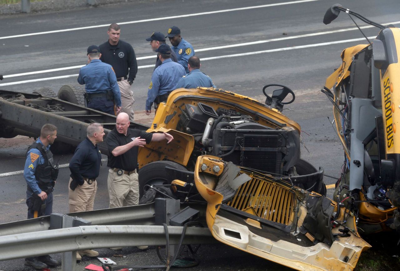 The Latest: Students return to school day after deadly crash