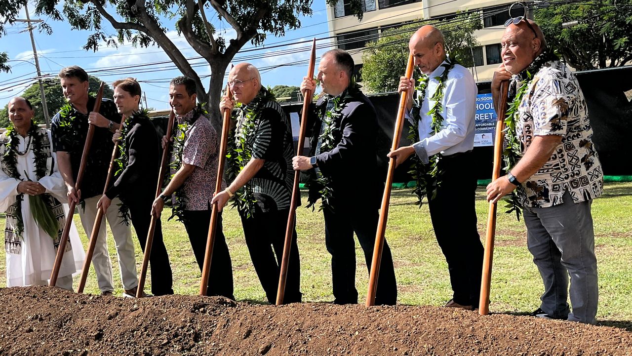 Honolulu Mayor Rick Blangiardi (center) called Friday's groundbreaking at the site of a new affordable housing project on School Street a milestone in the push to alleviate the state's housing crisis. (Spectrum News/Michael Tsai)
