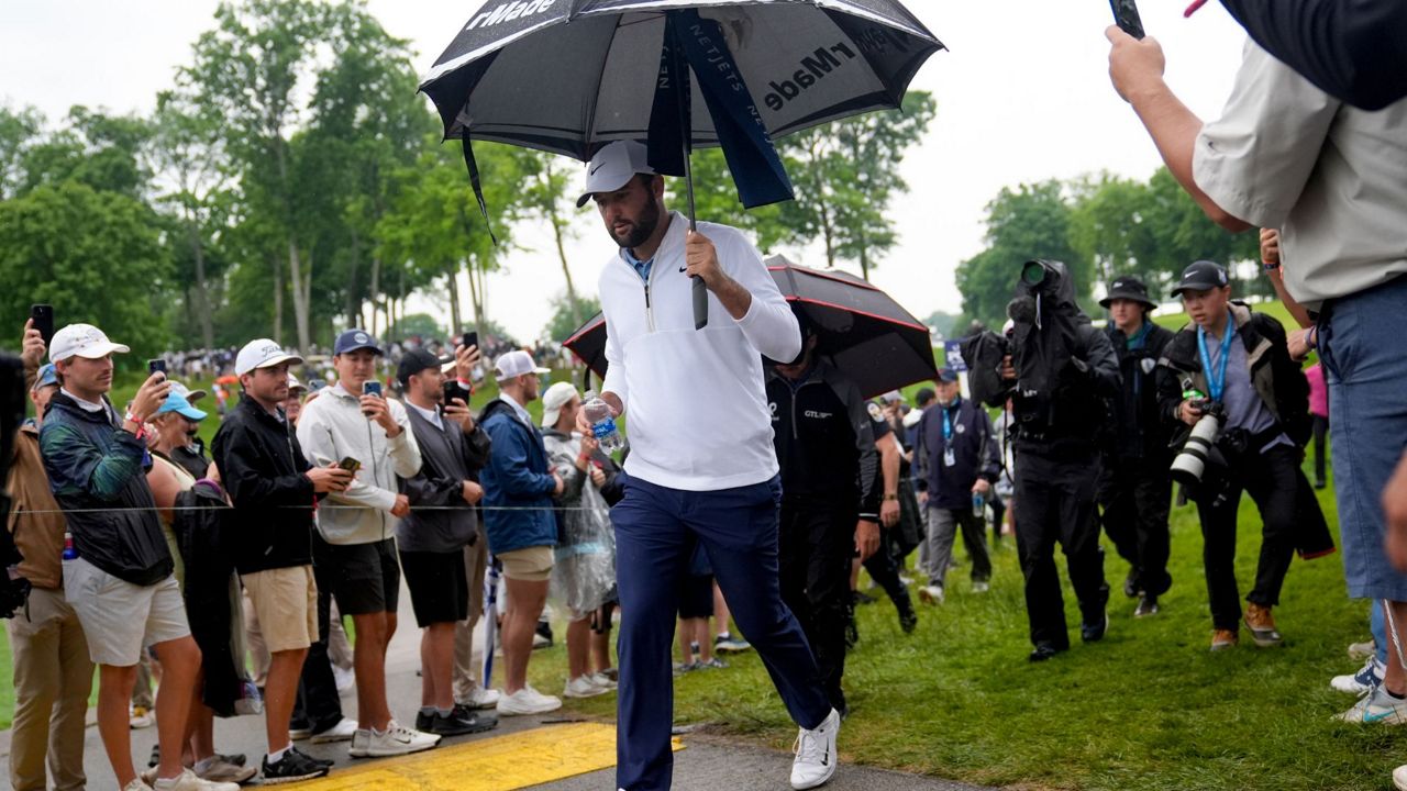 Scottie Scheffler walks to the tee on the 11th hole during the second round of the PGA Championship golf tournament at the Valhalla Golf Club, Friday, May 17, 2024, in Louisville, Ky. (AP Photo/Jeff Roberson)