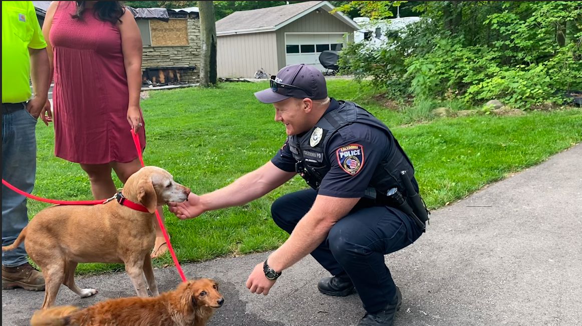 Police Officer Saves Family's Dog in Burning Home