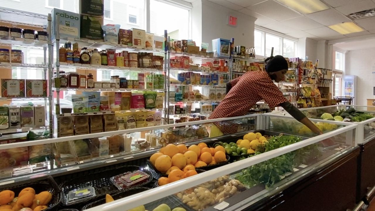 Woman in grocery store.