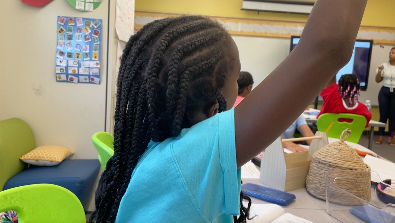 Students participate during class at Hunter Magnet Elementary School.