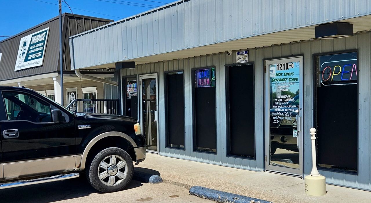 The exterior of Hot Shots Internet Cafe, an arcade in Moberly with slot-machine like games that the owner says are legal because they have a pre-reveal feature like Torch Electronics games at the center of a lawsuit that will go to trial in Jefferson City on Tuesday (Rudi Keller/Missouri Independent)