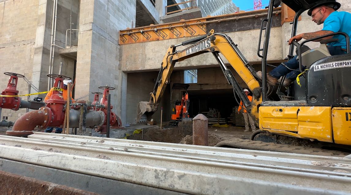 Crews in Clearwater Beach work at a construction site that will eventually become the beach's newest hotel. (Spectrum Bay News 9)