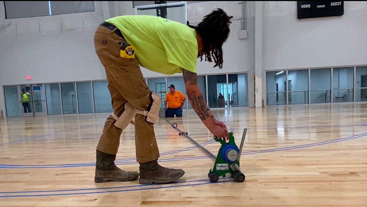 Athletes in Action basketball floor Robbins