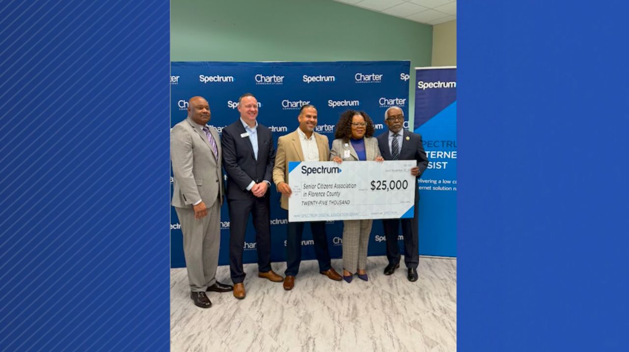 (From left to right): City manager of Florence Scotty Davis, Senior Director, GA Chris Bailey, AVP Alex Gonzalez, Executive Director SCA Florence Linda Johnson, State Representative Terry Alexander present the $25,000 check at the ceremony on Wed., Nov. 20, 2024 in Florence, S.C.