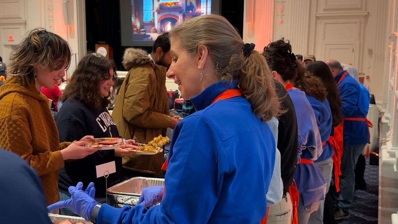 Around 25 volunteers assist in putting on the first CWRU Family Thanksgiving (Spectrum News/ Tanya Velázquez).
