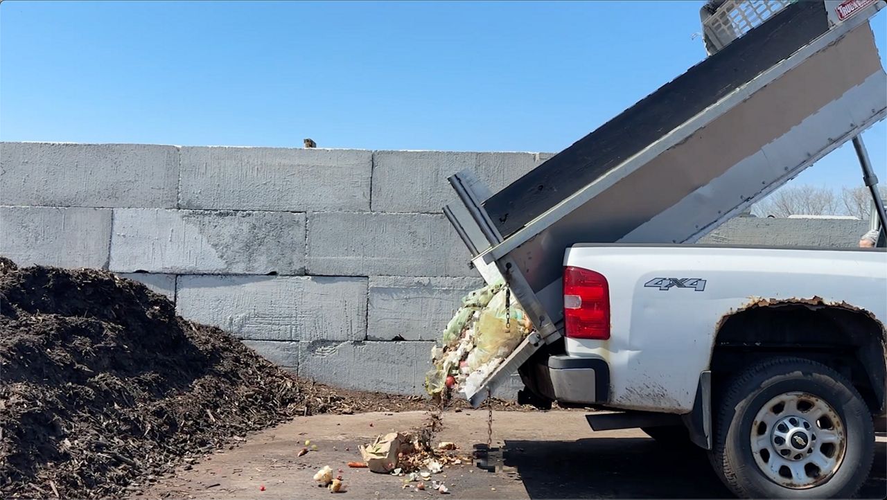 truck dumps food scraps to make composting