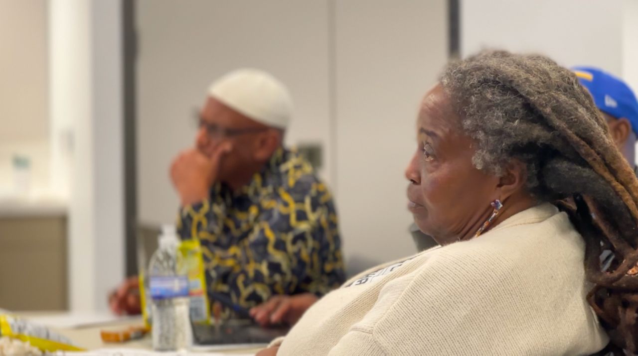 Chairwoman Connie Burton (right) said Tampa’s Racial Reconciliation Committee needs more support from City to be successful. (Spectrum News image)