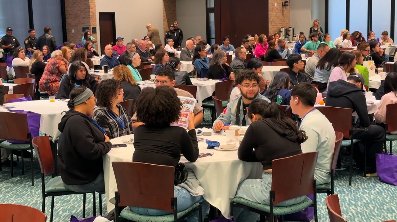 More than a dozen panelists and guest speakers took the stage at Lorain County Community College (Spectrum News/ Tanya Velazquez).