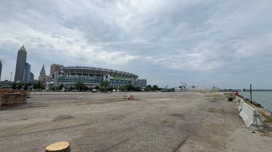 A zoomed out view of the land in front of Cleveland Brown's stadium shows acres of concrete that the Northcoast Waterfront Development Corporation is working to develop.