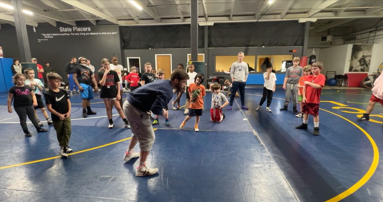 Rochester coach builds a future for youth wrestling on and off the mat