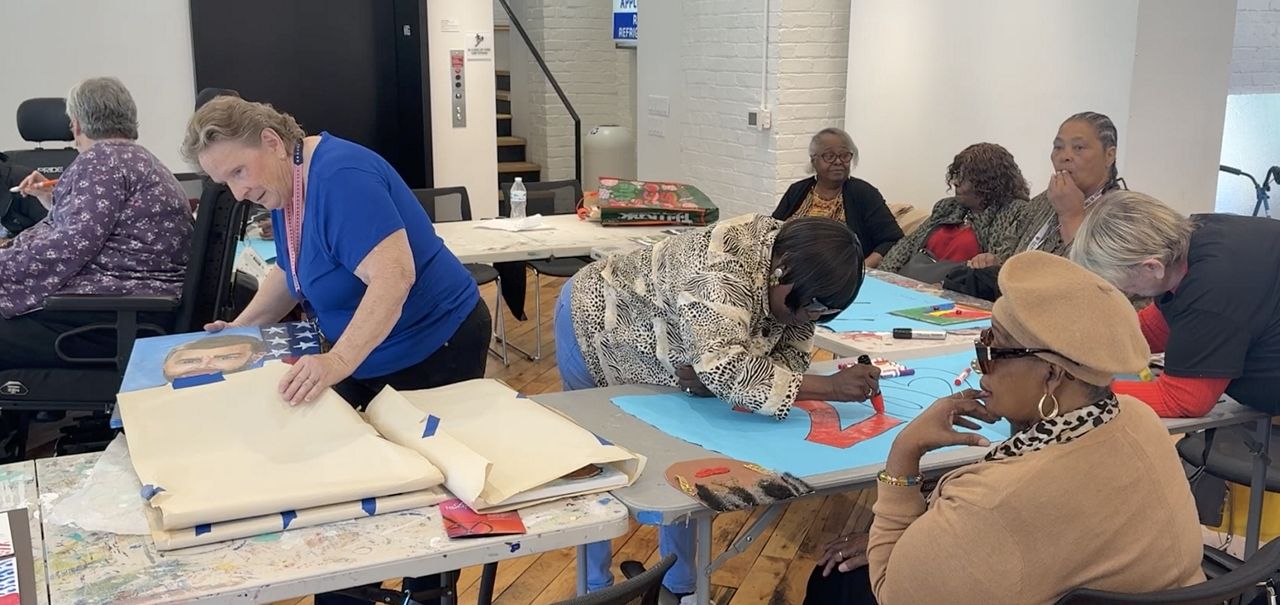 Small group of seniors bond through art