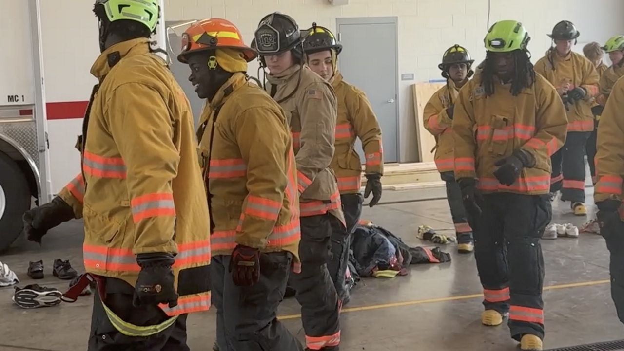 Lakota East football team learns life skills from firefighters